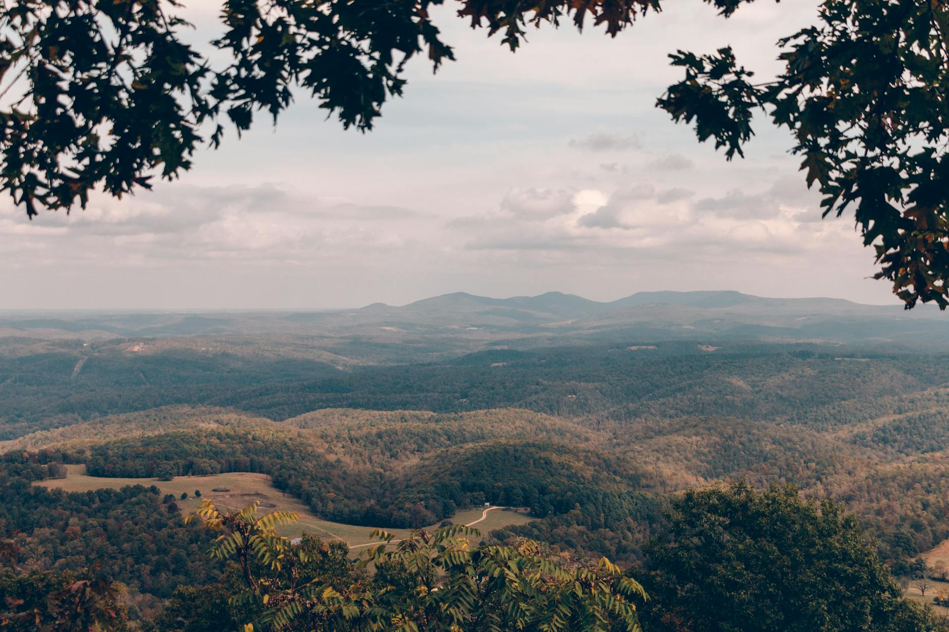 aerial photography of hills under the sky